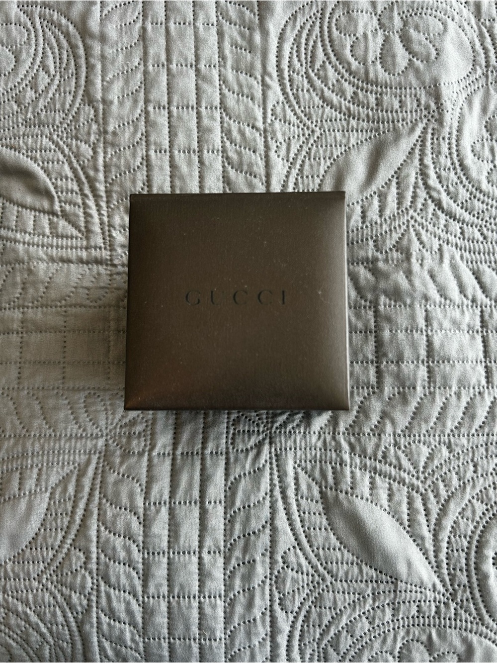 Gucci Men's Silver Wristwatch With Black Leather Strap.